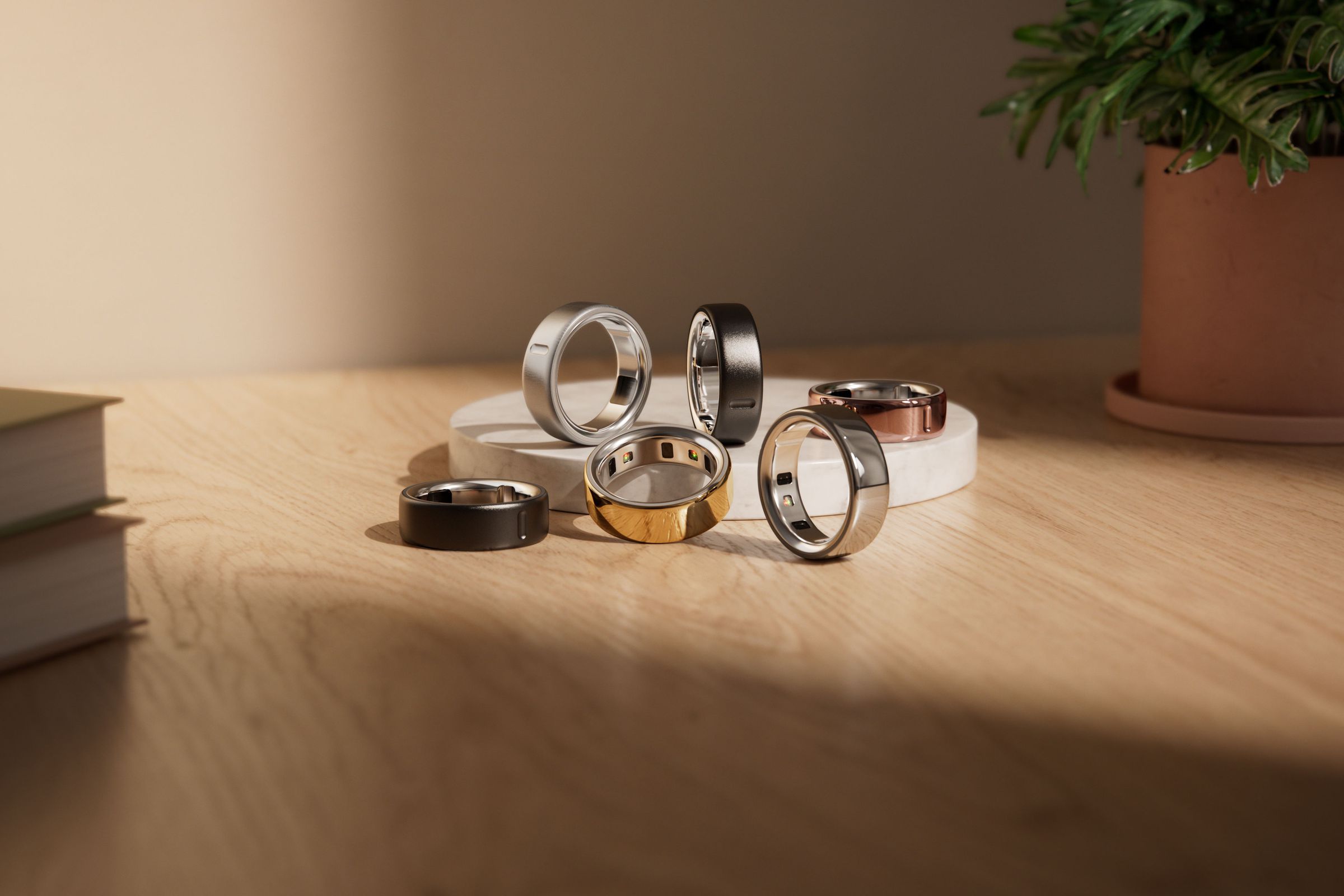 Various versions of Oura Ring 4 on a table