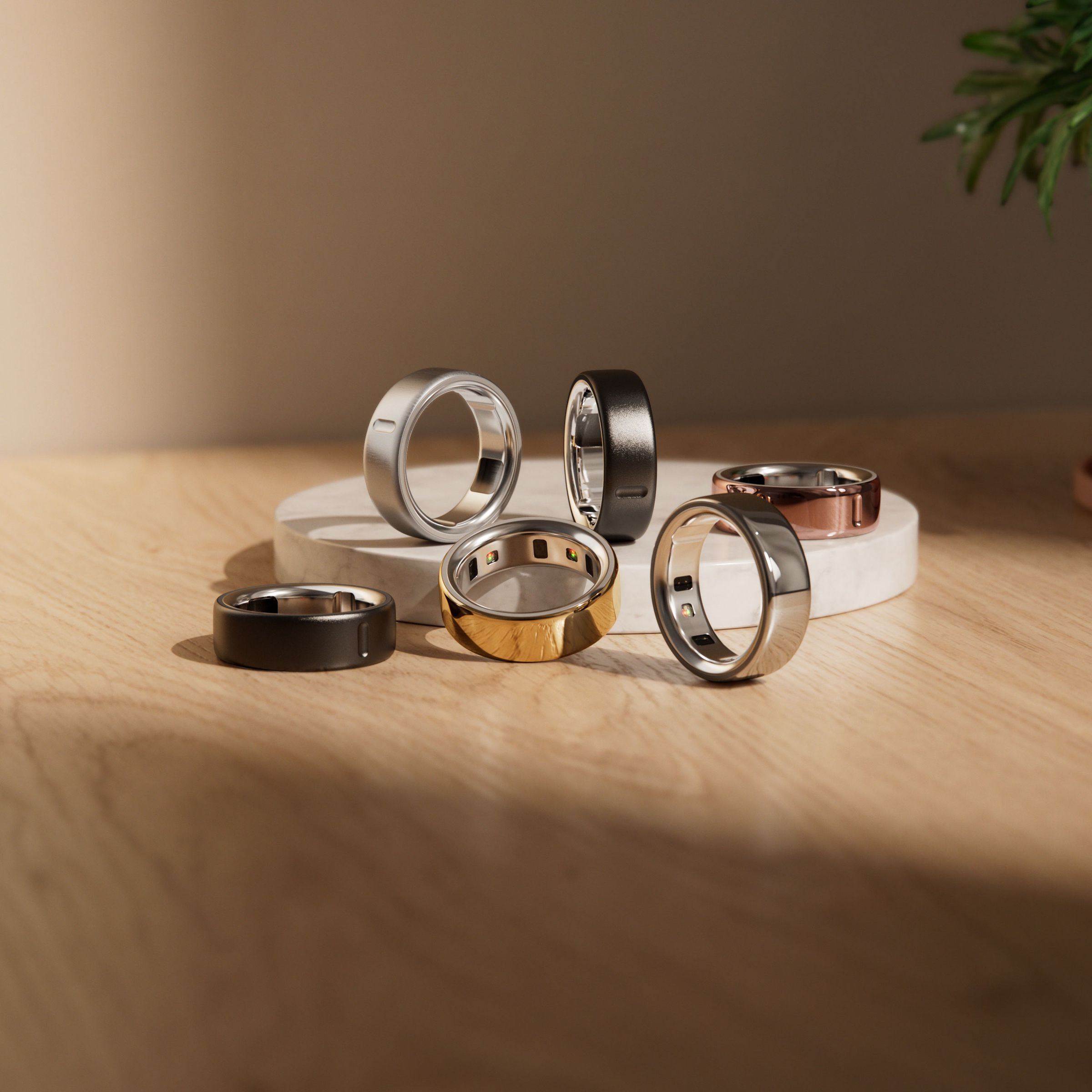 Various versions of Oura Ring 4 on a table