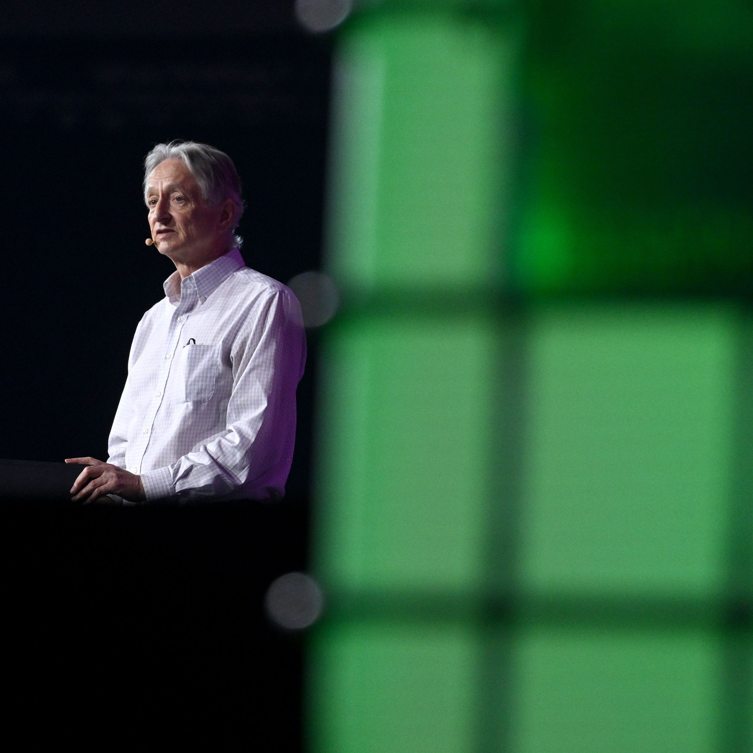 A man stands at a podium