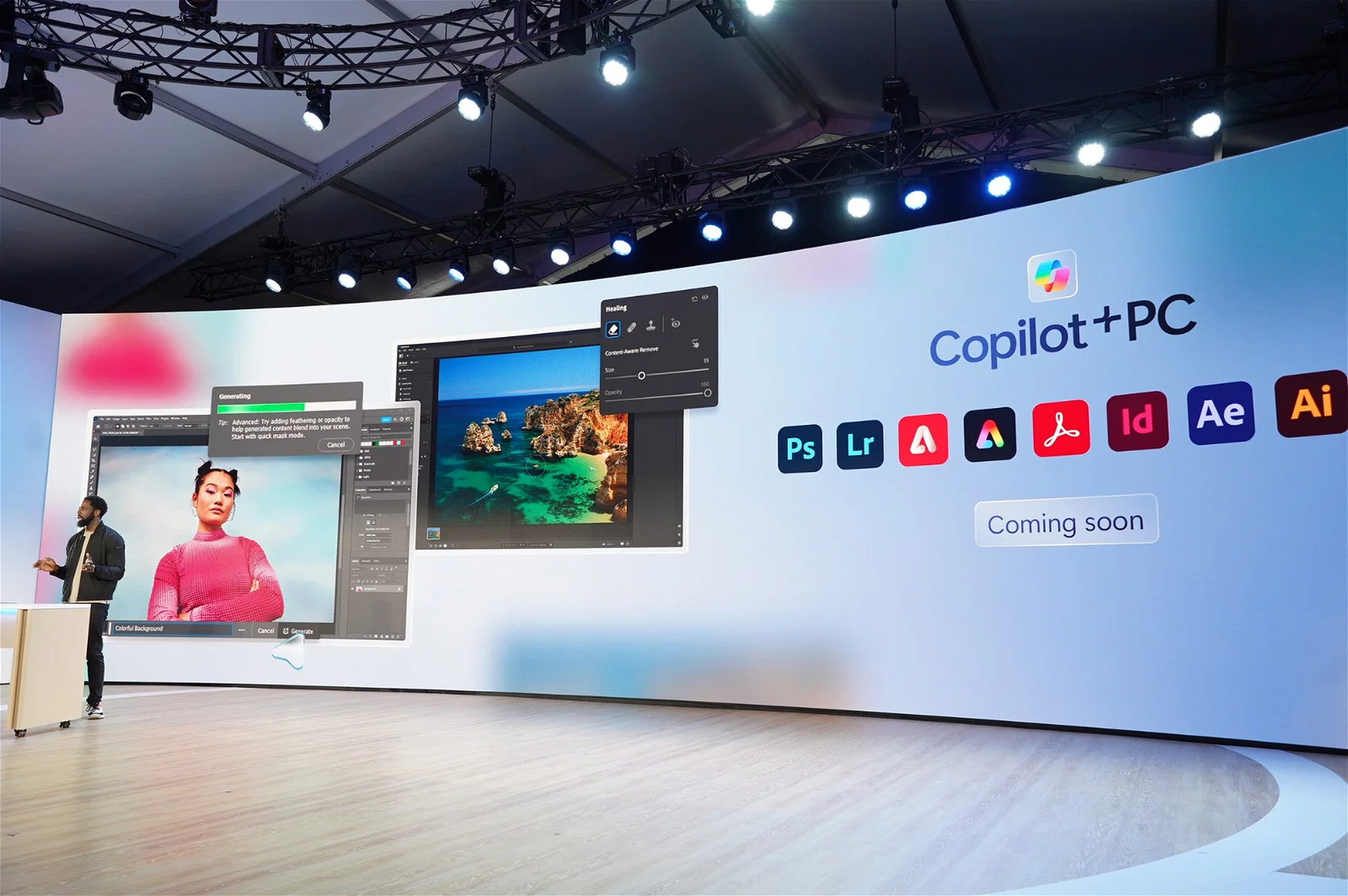 Photo of stage with Adobe logos at Microsoft Surface event