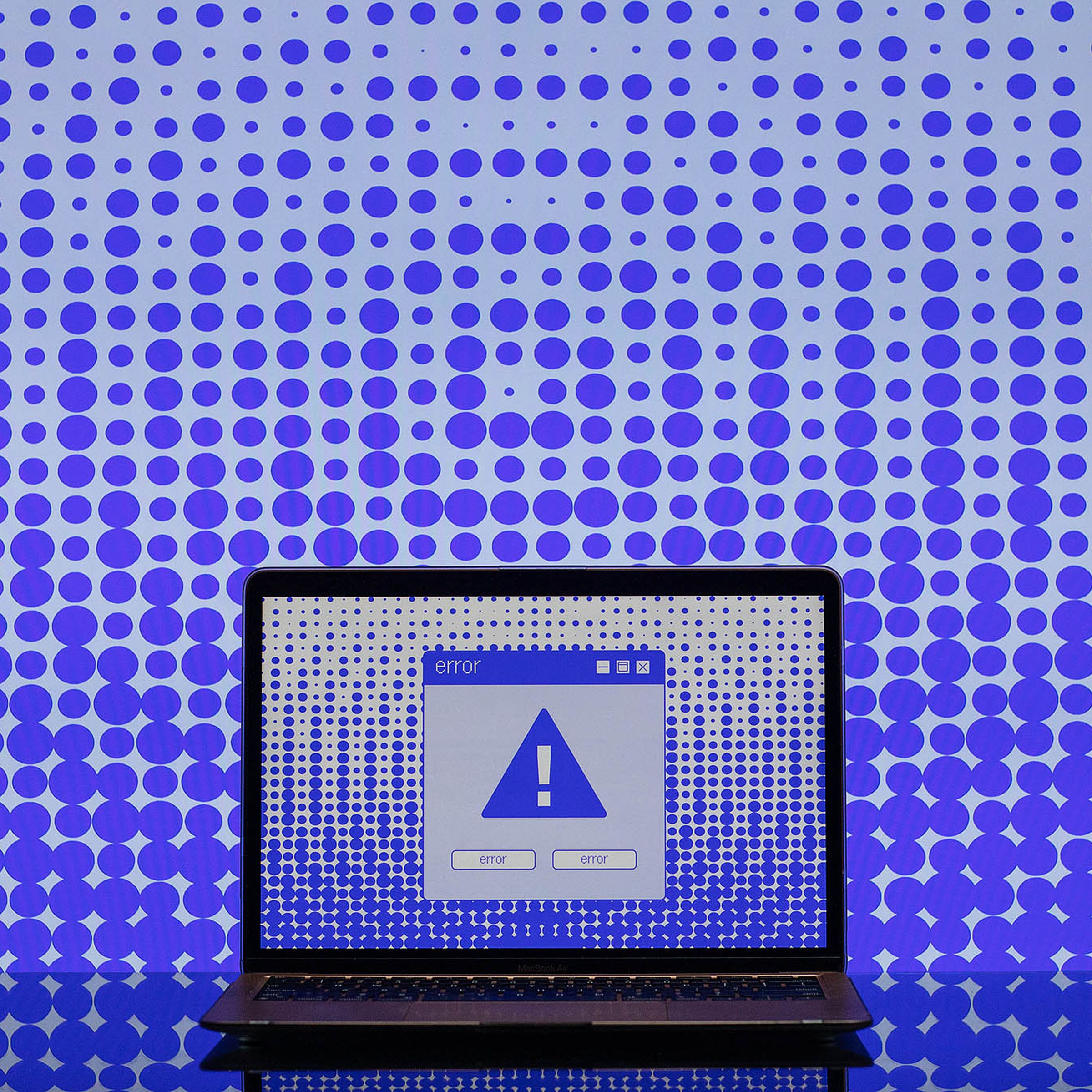Illustration of a computer screen with a blue exclamation point on it and an error box.