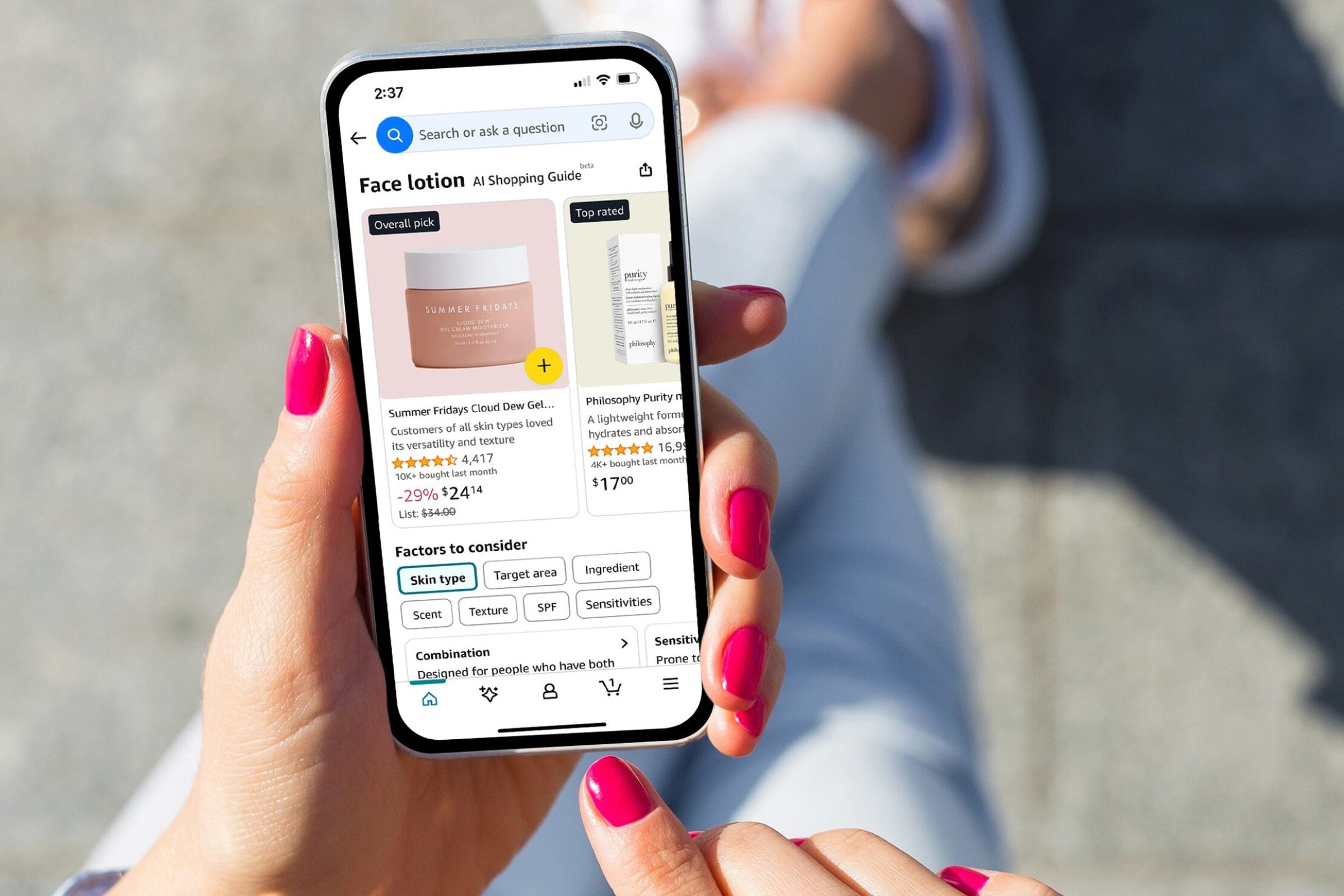 Someone using the Amazon app on a smartphone, displaying the new AI shopping guide feature.