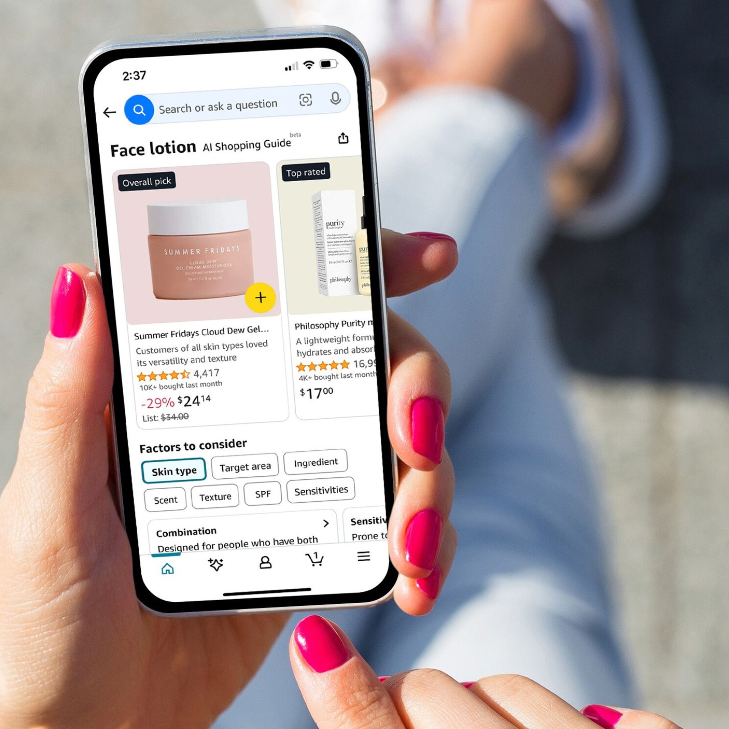 Someone using the Amazon app on a smartphone, displaying the new AI shopping guide feature.