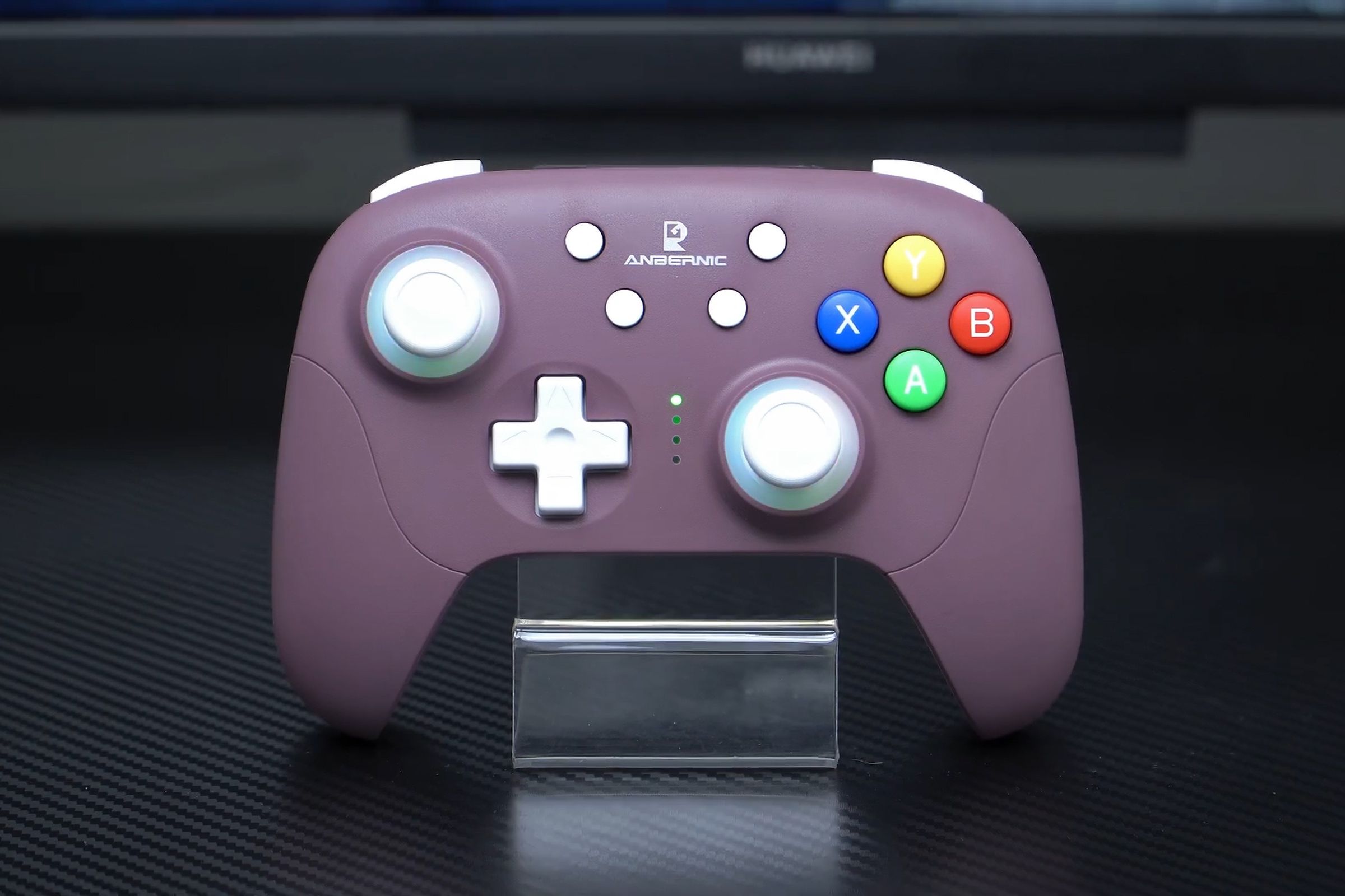 A close-up of Anbernic’s RG P01 wireless controller in a purple finish.