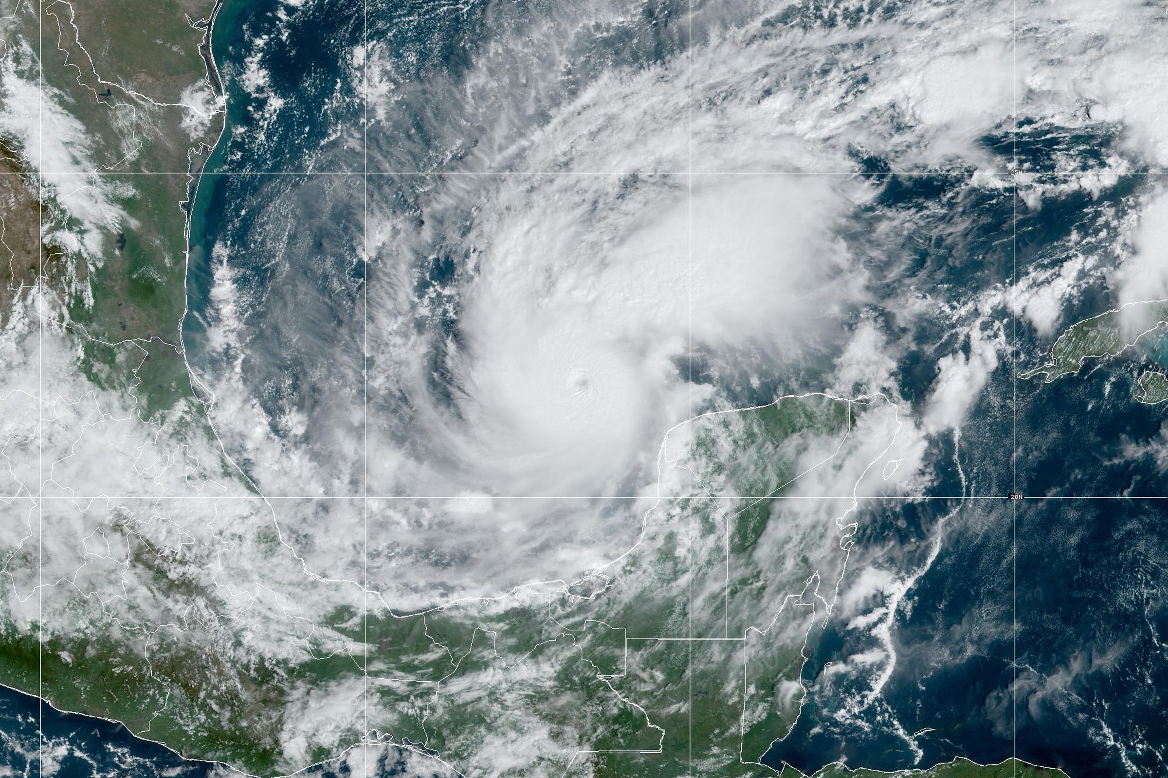 A satellite image of a large hurricane swirling over the Gulf of Mexico.